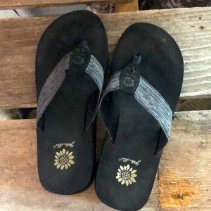 Yellow box gray flip flops